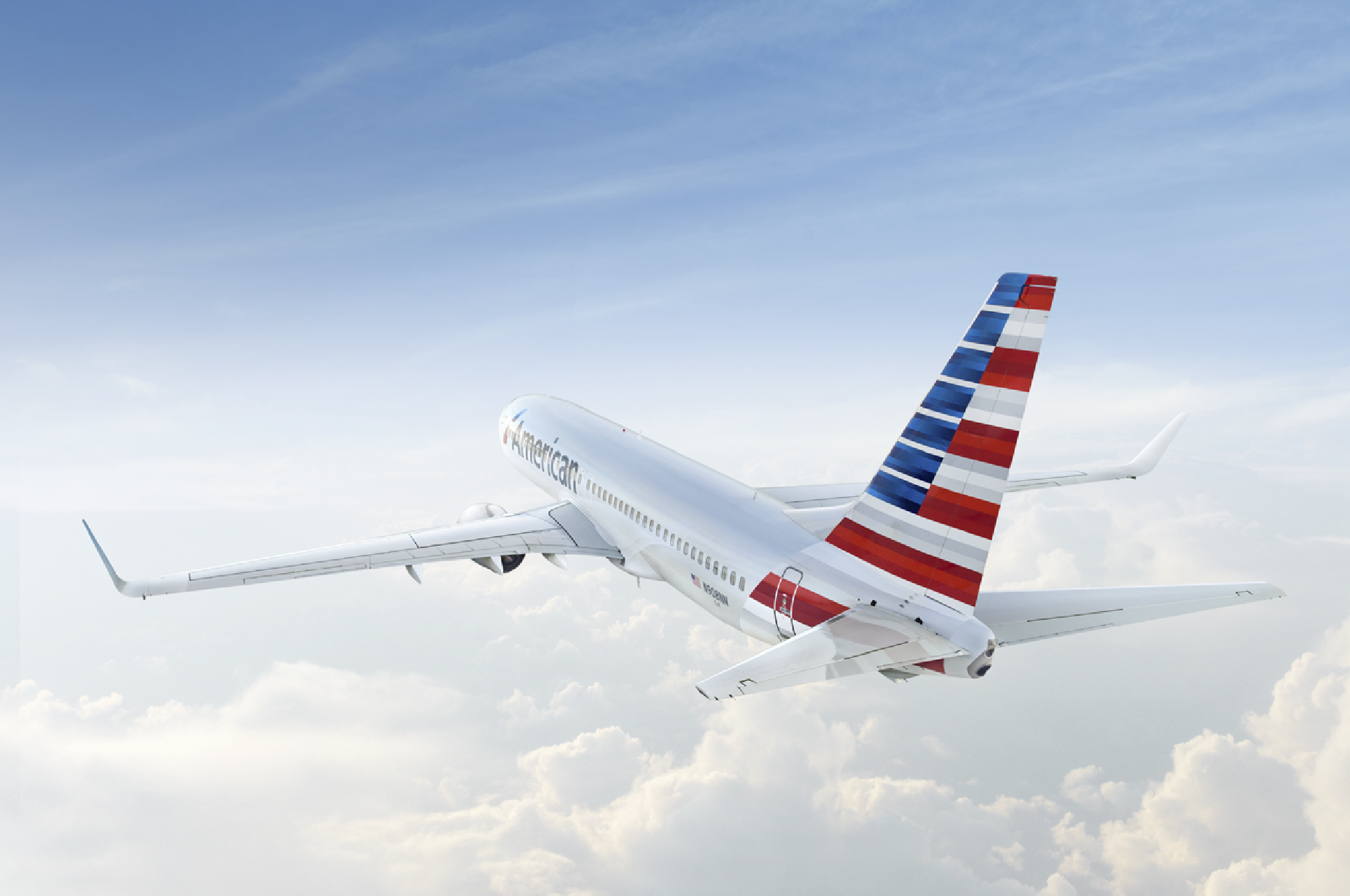 American Airlines jet climbing through the sky above the clouds