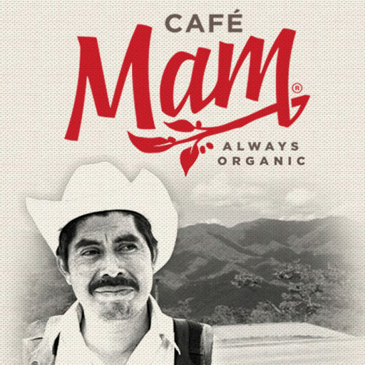 Cafe Mam Always Organic packaging with a coffee farmer in a cowboy hat over a mountain landscape