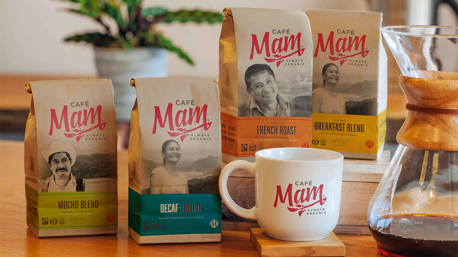Cafe Mam coffee bags in Mocha Blend, Decaf Italian, French Roast and Breakfast Blend with mug and pour-over carafe