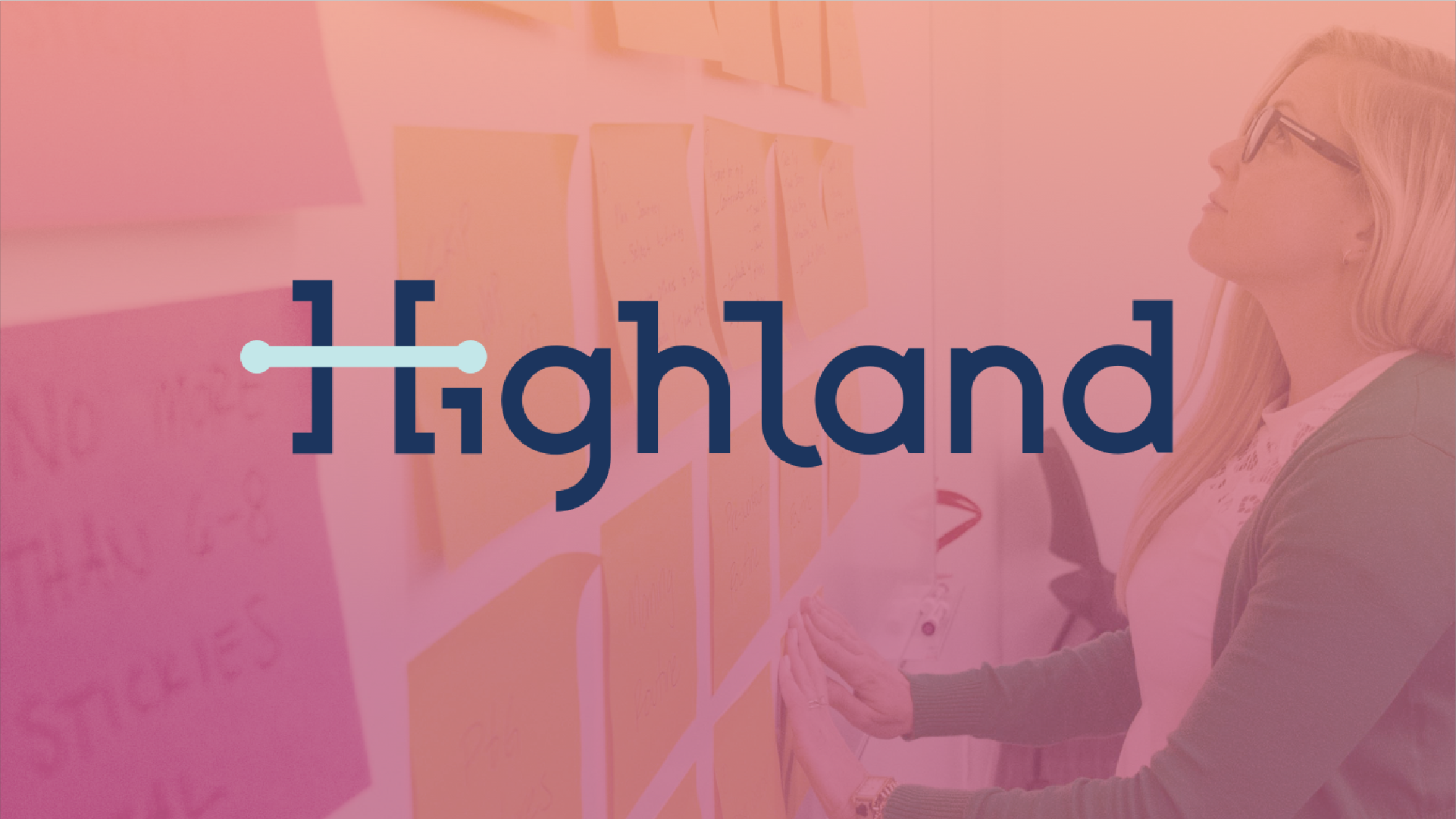 Highland logo over woman arranging sticky notes on a wall during a workshop