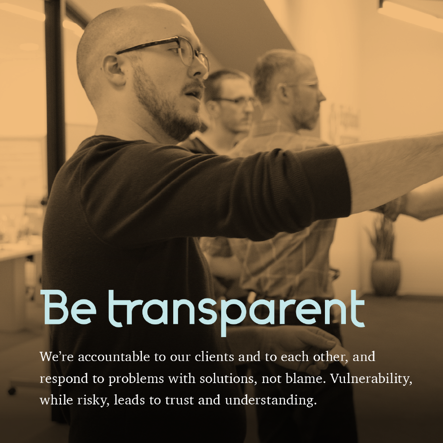 Highland value Be transparent over a toned office shot of a bearded man in glasses gesturing during a workshop