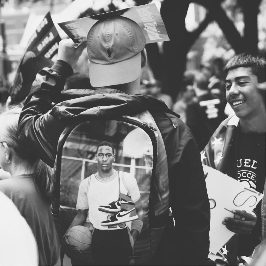 Nike London crowd scene with a backpack printed with Michael Jordan and Air Jordan 1 sneakers