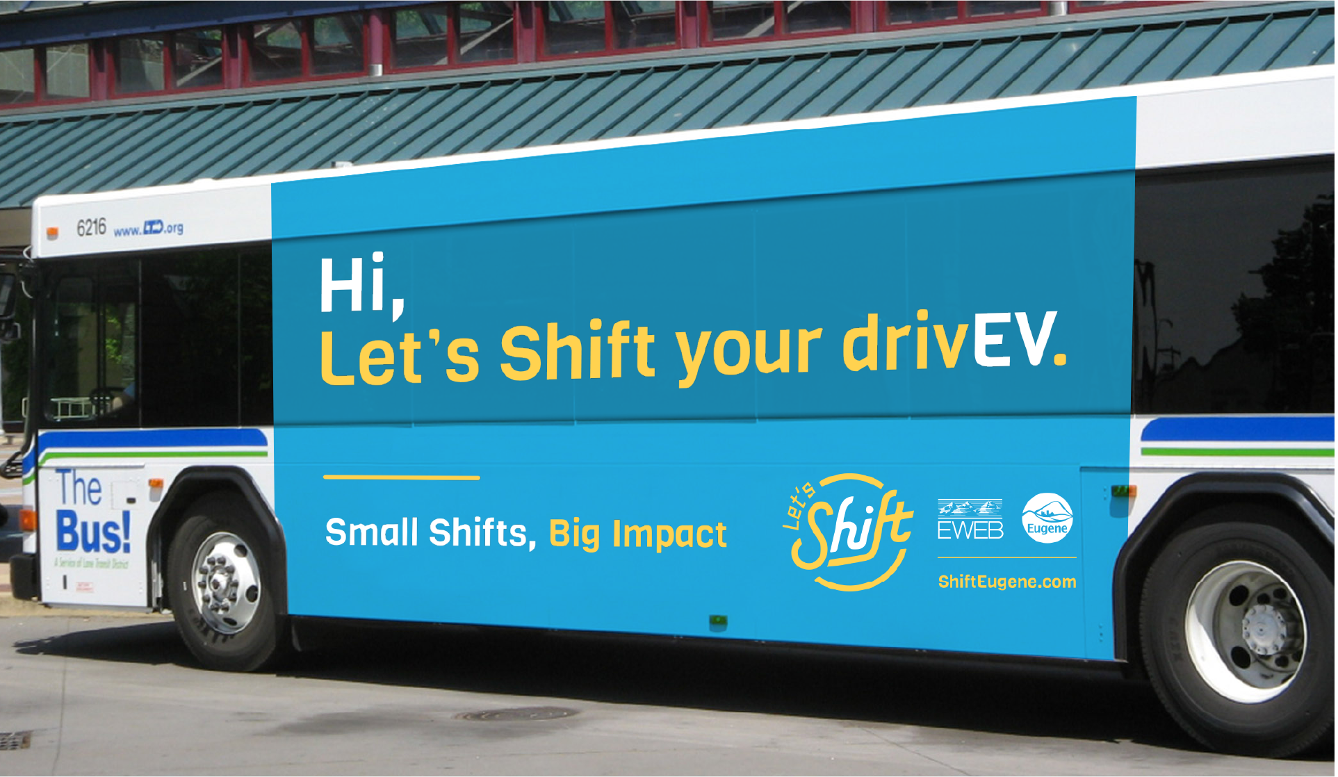Blue transit bus wrapped with Shift Eugene ad reading "Hi, Let's Shift your drivEV."