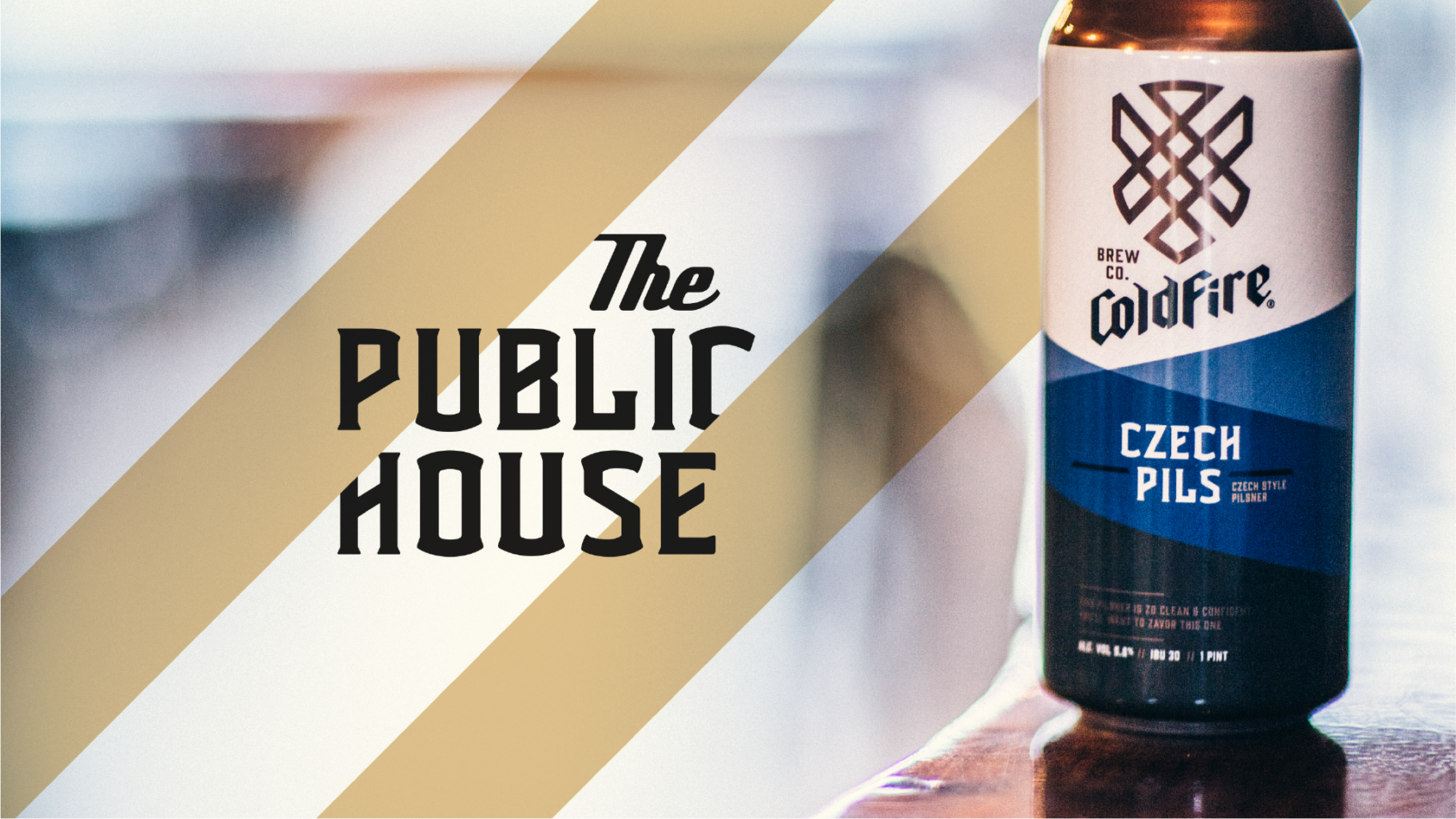 ColdFire Czech Pils bottle beside 'The Public House' lettering over gold diagonal stripes