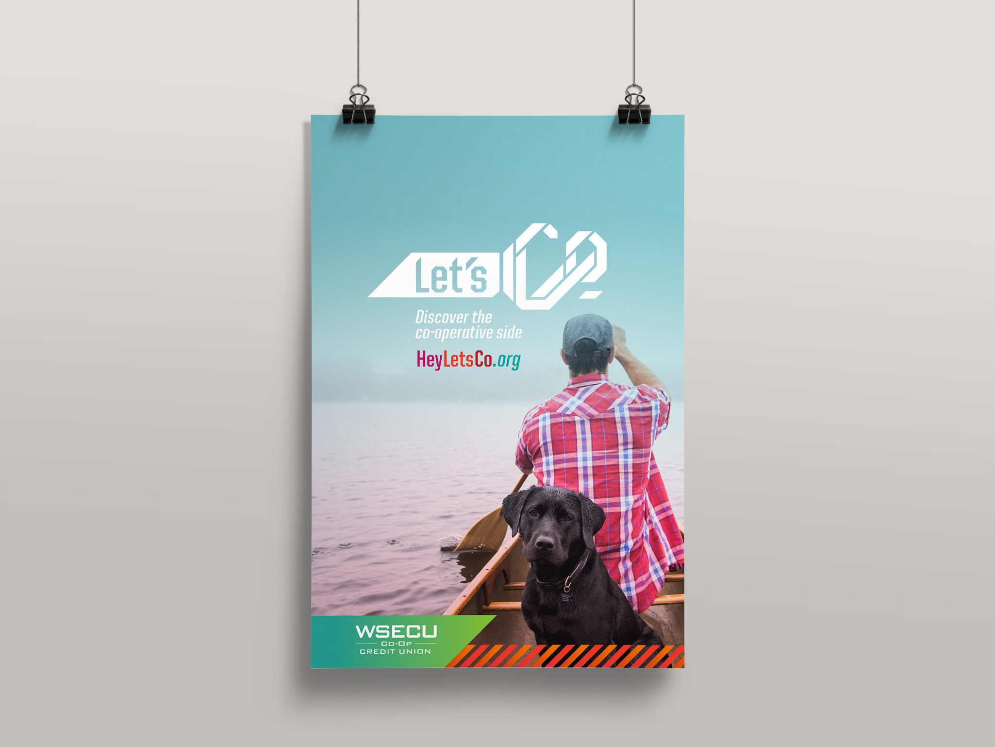 WSECU Let's Co poster of a man and dog in a canoe, Discover the co-operative side, HeyLetsCo.org
