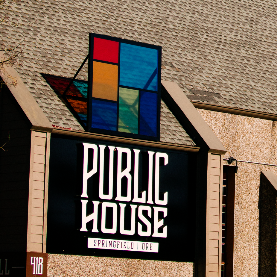 Public House Springfield Ore sign with stained-glass panel on a shingled building, 418