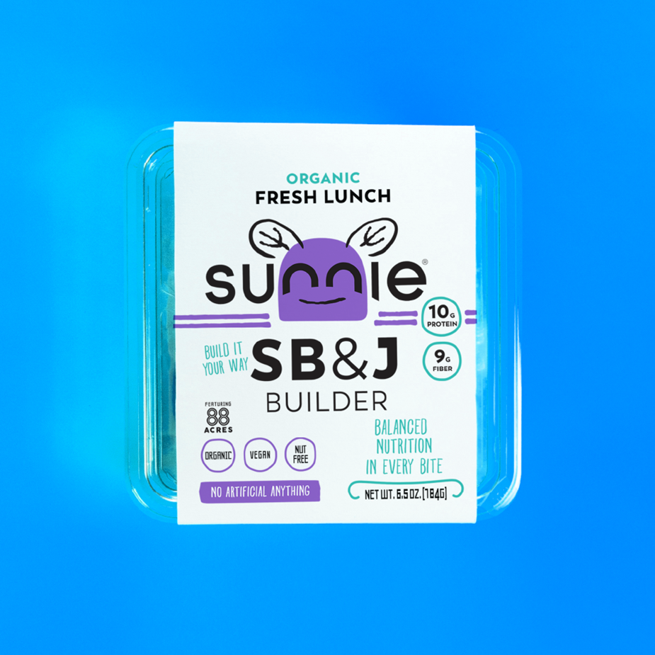 Sunnie Organic Fresh Lunch SB&J Builder pack on a blue background