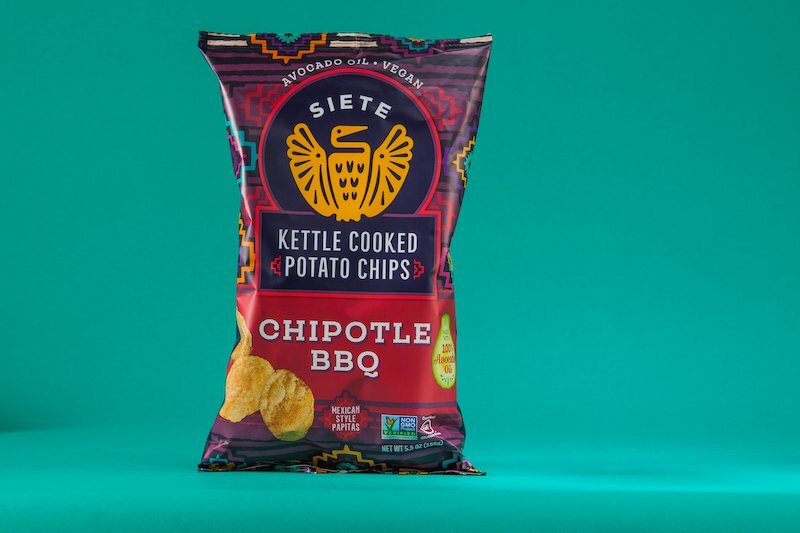 Siete Chipotle BBQ Kettle Cooked Potato Chips bag on a teal background