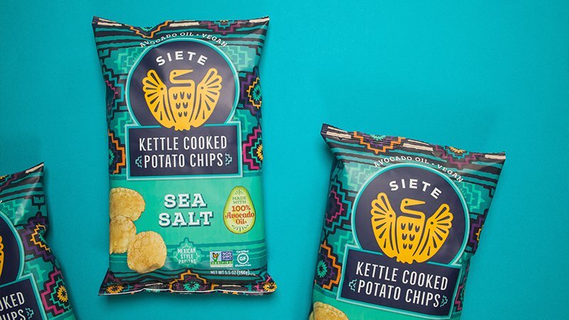 Siete Sea Salt Kettle Cooked Potato Chips bags on a teal background