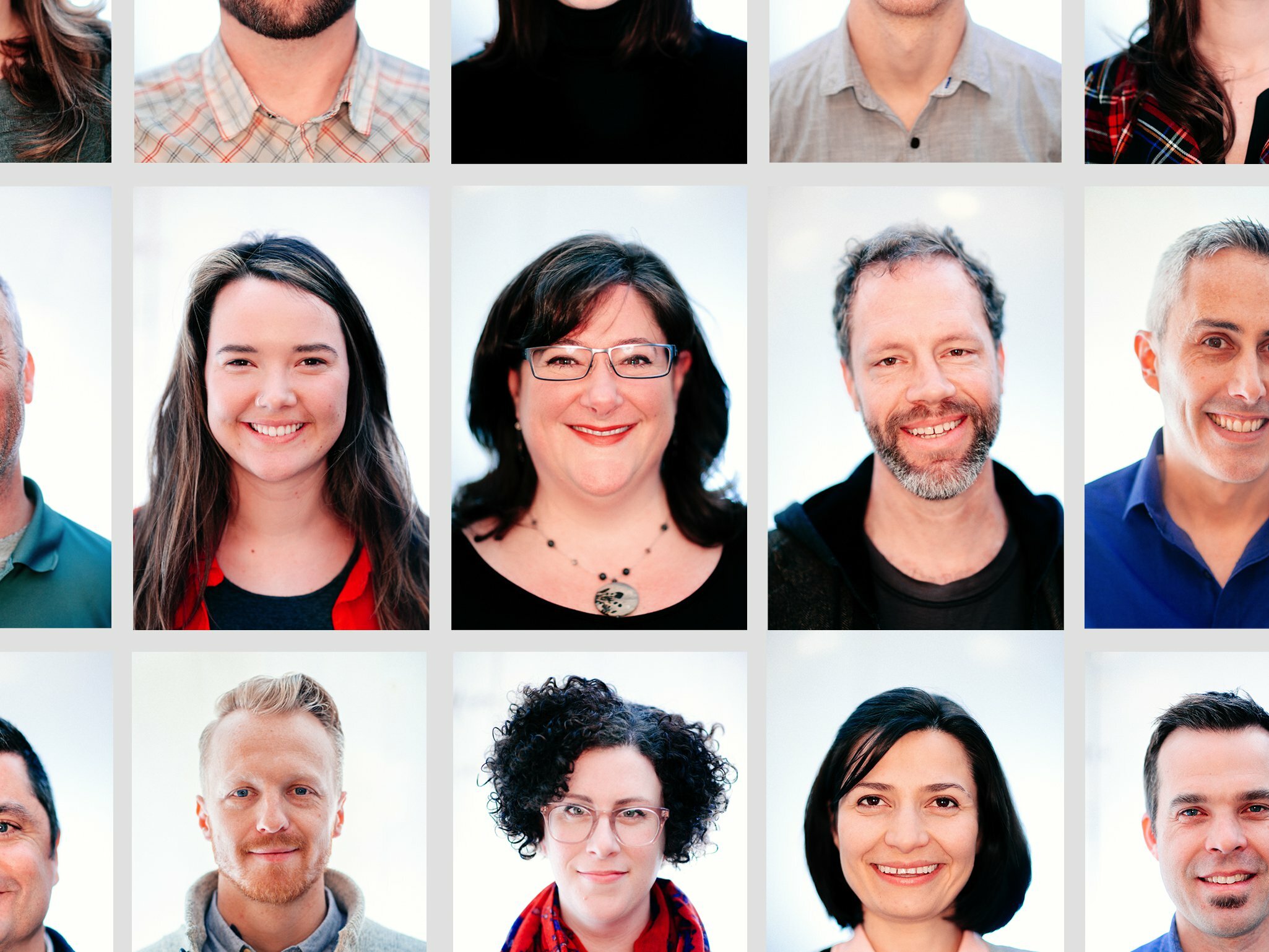 Grid of Drawn team member headshots, a diverse mix of smiling people