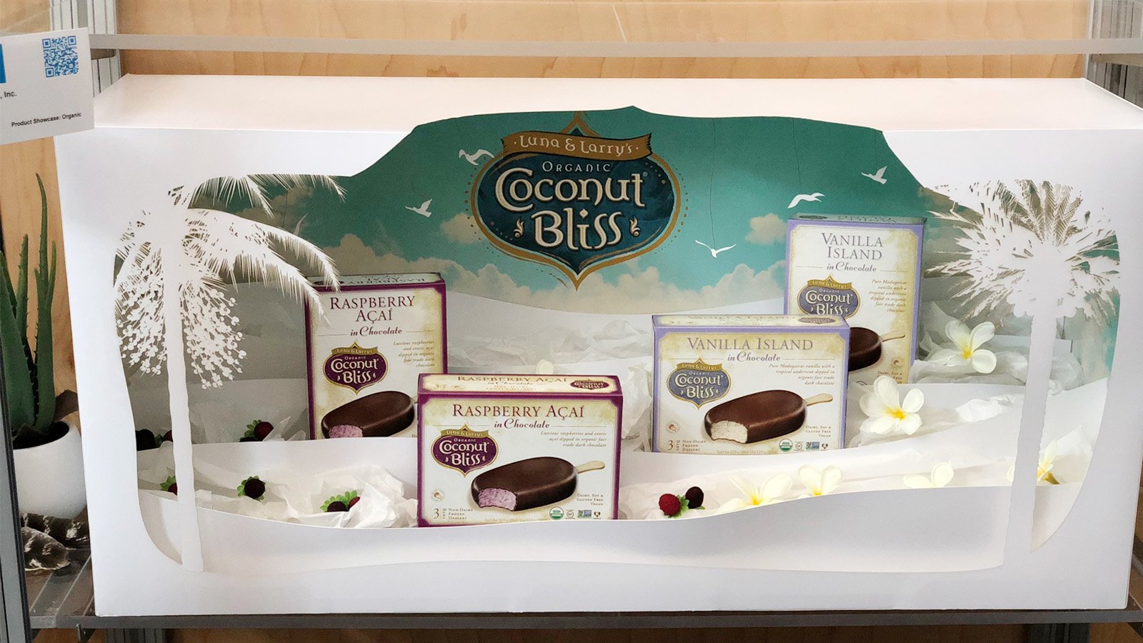 Coconut Bliss showcase display with Raspberry Acai and Vanilla Island chocolate-dipped bars