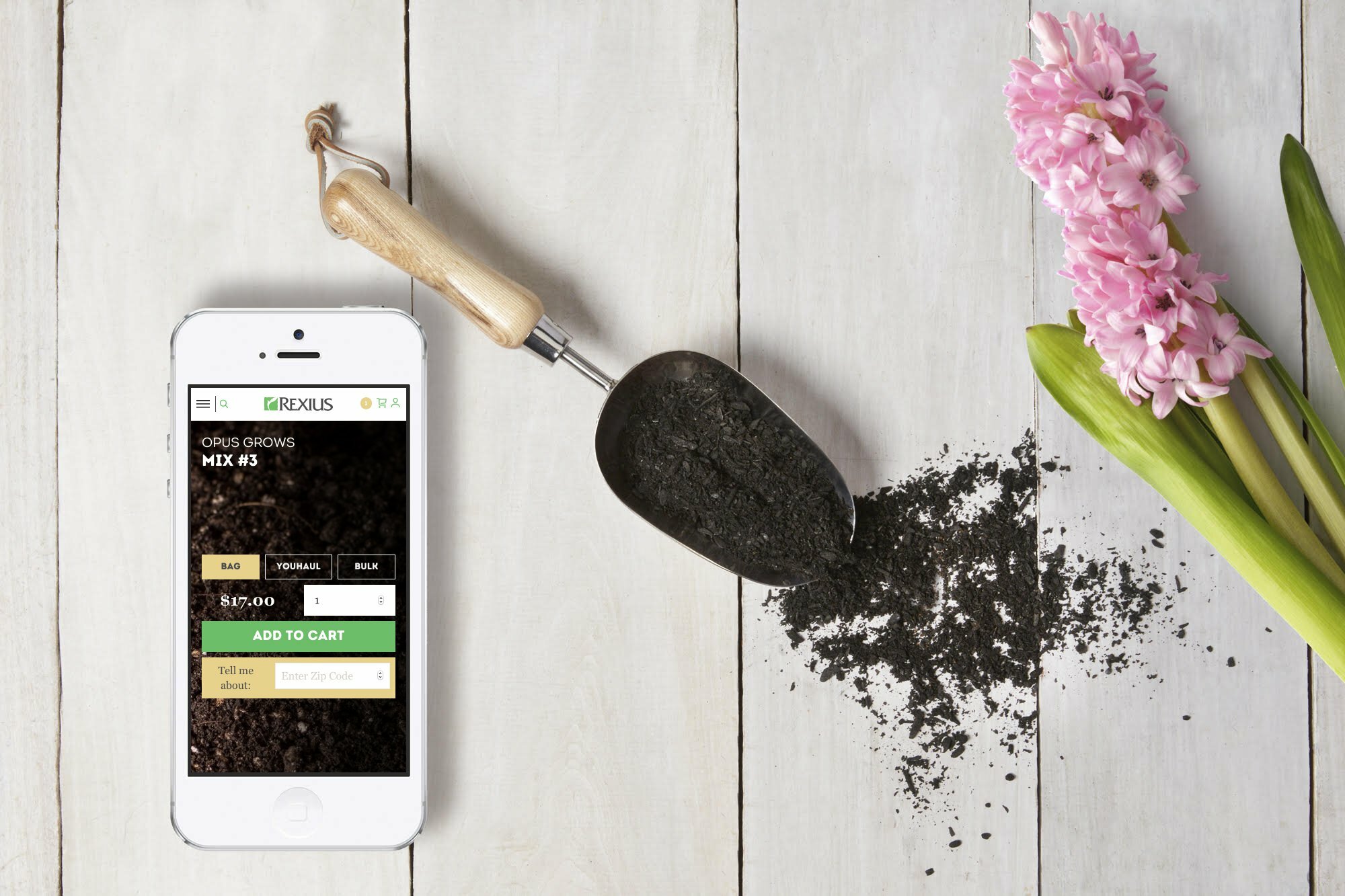 Phone showing Rexius Opus Grows Mix #3 add-to-cart screen beside a soil scoop and pink hyacinth